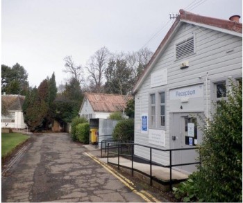 Image shows photo of a white clapboard building which is the new Edinburgh Headway centre. 